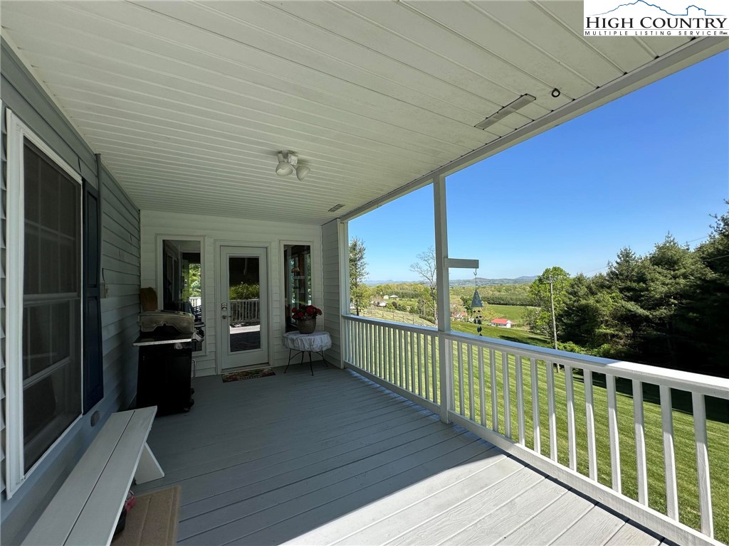 4952 Nile Road Sparta, NC 28675 - Photo 7 of 36 a view of a balcony with couch