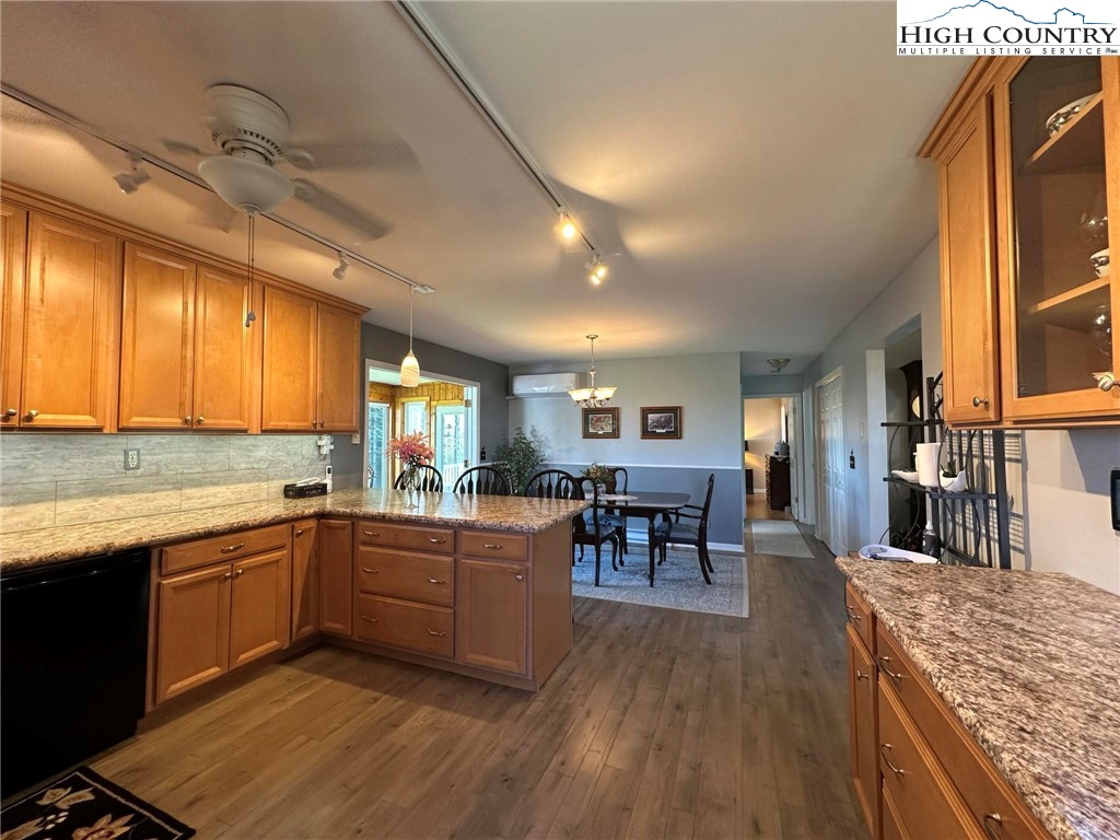4952 Nile Road Sparta, NC 28675 - Photo 9 of 36 a kitchen with lots of counter top space and dining table
