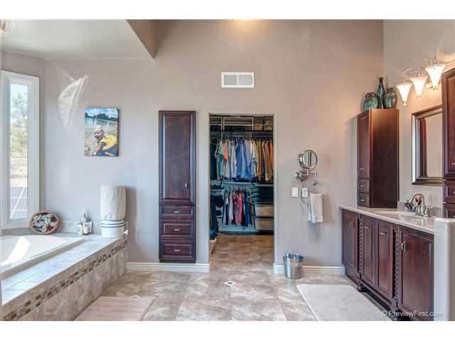 15396 Broad Oaks Road El Cajon, CA 92021 - Photo 19 of 25 HUGE MASTER BATH WITH VAULTED CEILINGS, SEPARATE TUB/SHOWER, WALK IN CLOSET, AN ADDITIONAL LAUNDRY ROOM AND MORE..