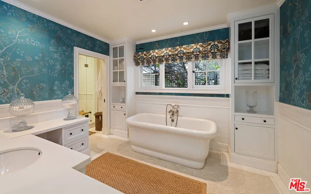 a bathroom with a sink and a bathtub