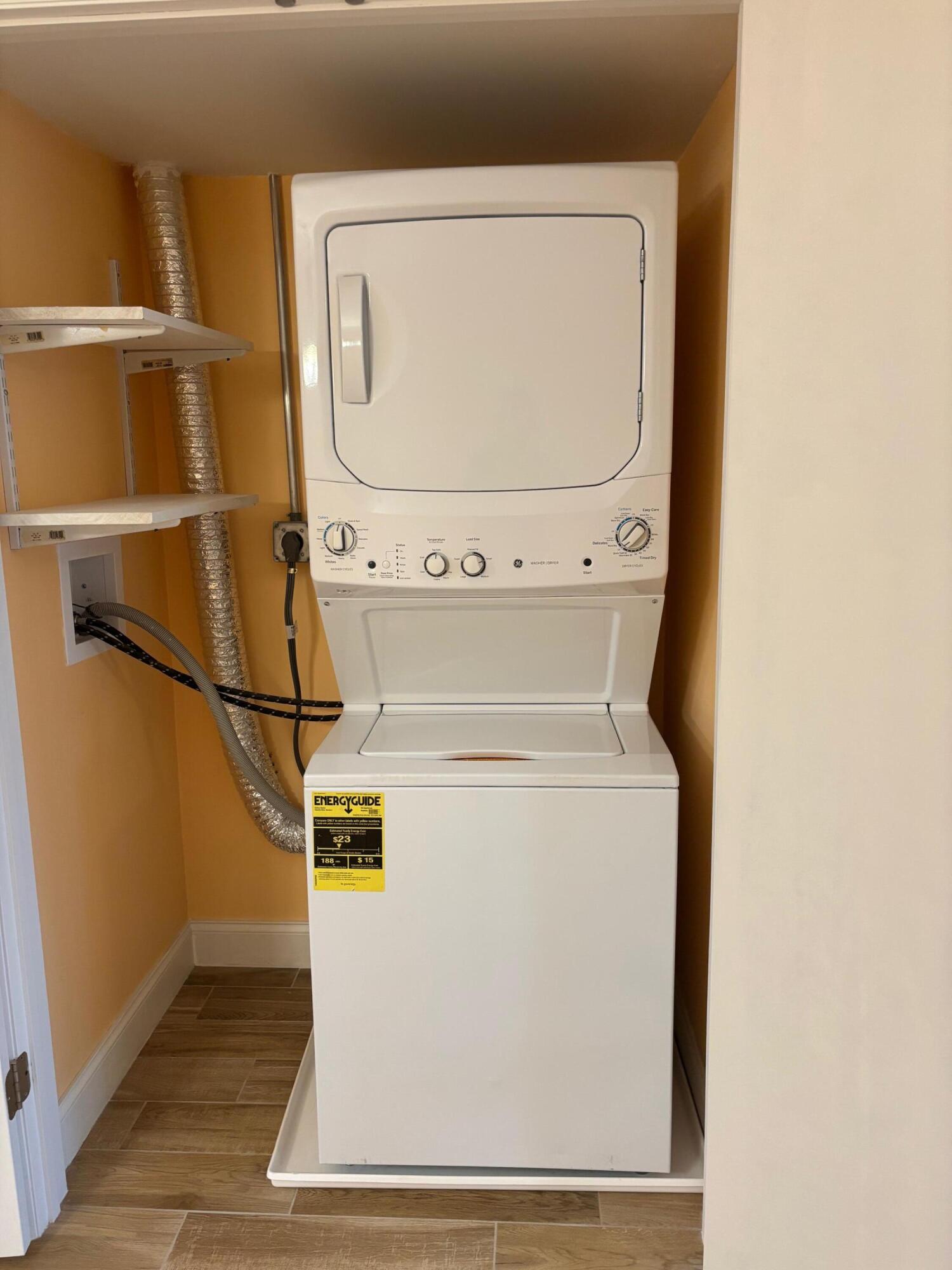 4411 Trevi Court, Unit 106 Lake Worth, FL 33467 - Photo 16 of 21 a utility room with dryer and washer