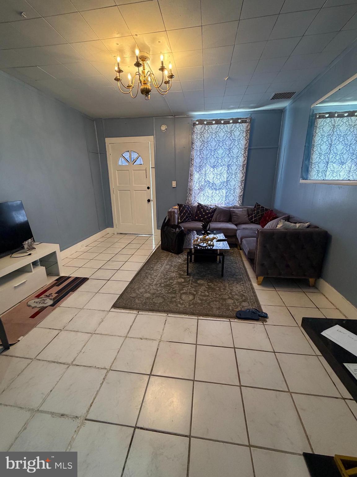 324 Spring Garden Street Reading, PA 19602 - Photo 4 of 20 a living room with a couch