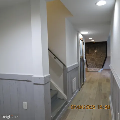 a view of a chairs and table on the wooden deck