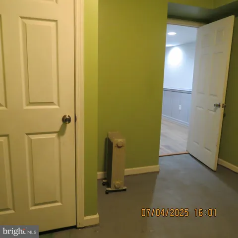 a view of a chairs and table on the wooden floor
