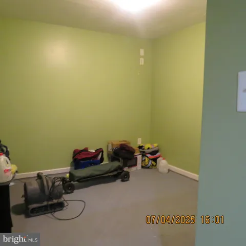 a view of an house with backyard space and garden