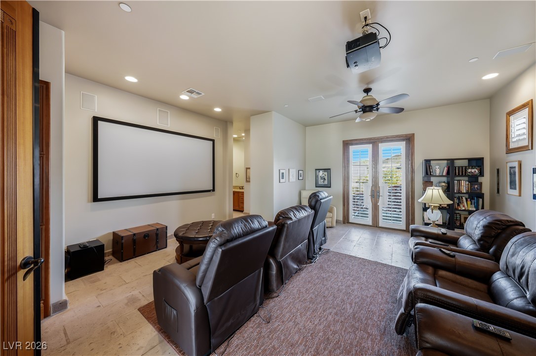 779 Bolle Way Henderson, NV 89012 - Photo 57 of 89 Theatre room with a custom walk in closet, wine fridge bar and 3/4 bathroom.