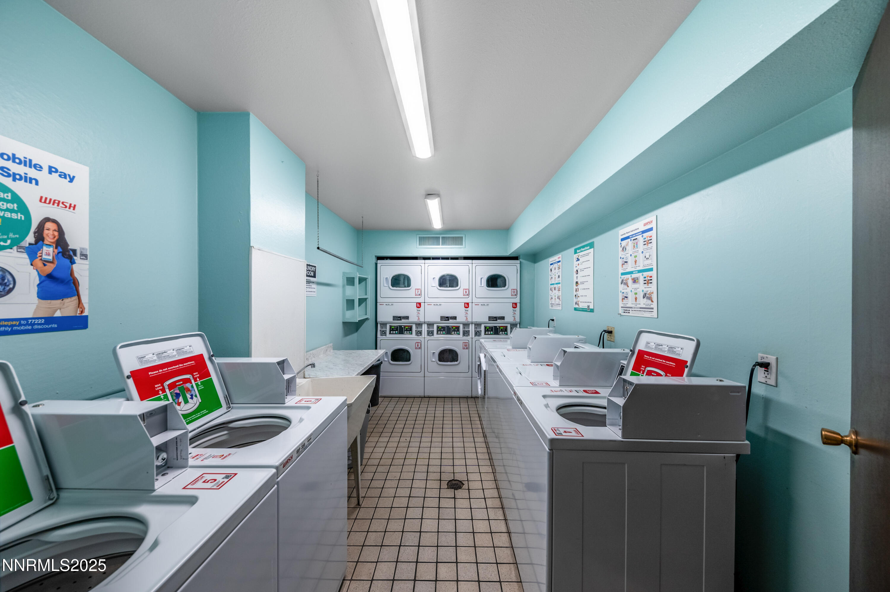 2700 Plumas Street, Unit 211 Reno, NV 89509 - Photo 10 of 11 a living room with furniture and a flat screen tv