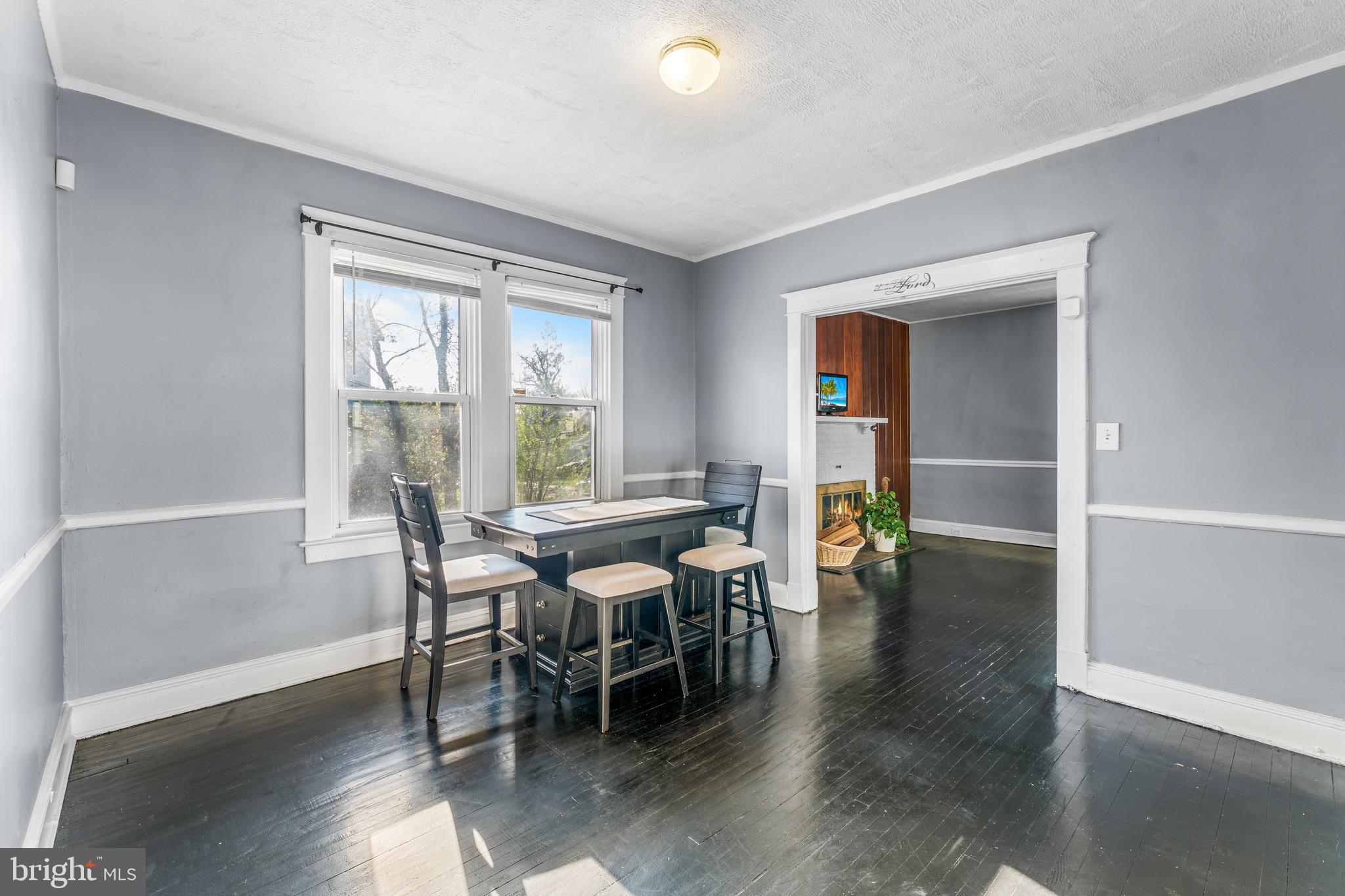 608 Tunbridge Road Baltimore, MD 21212 - Photo 9 of 27 a view of a dining room with furniture and wooden floor