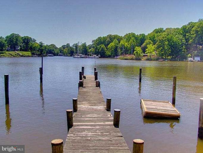 330 Riverside Road Edgewater, MD 21037 - Photo 18 of 26 a view of a lake with outdoor space