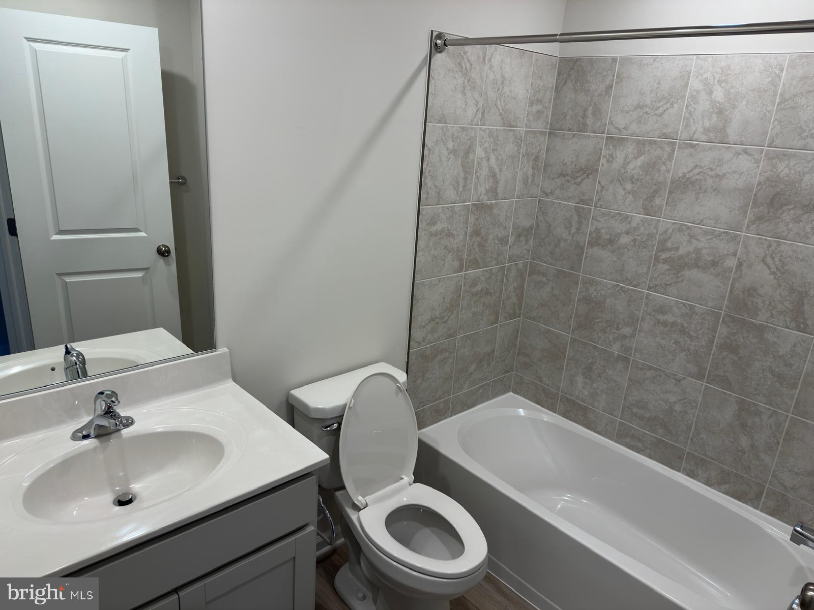 1260 Red Clover Lane Ranson, WV 25438 - Photo 18 of 20 a bathroom with a sink a toilet and bathtub