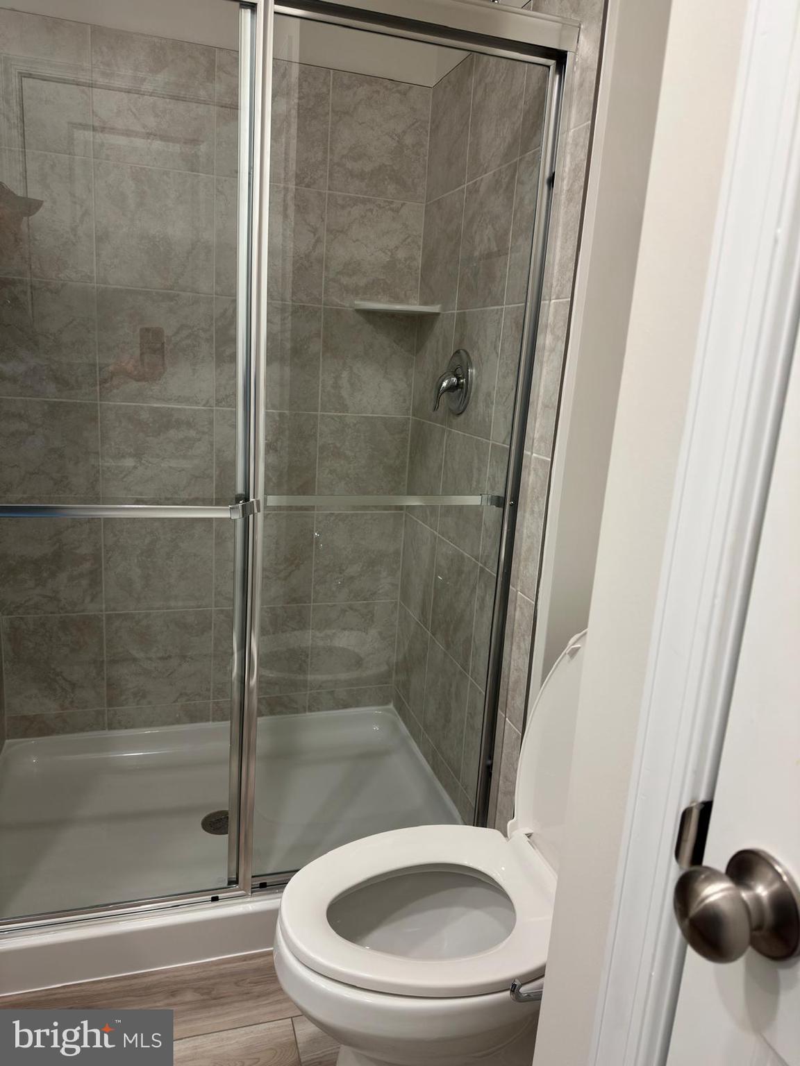 1260 Red Clover Lane Ranson, WV 25438 - Photo 19 of 20 a bathroom with a toilet and a shower