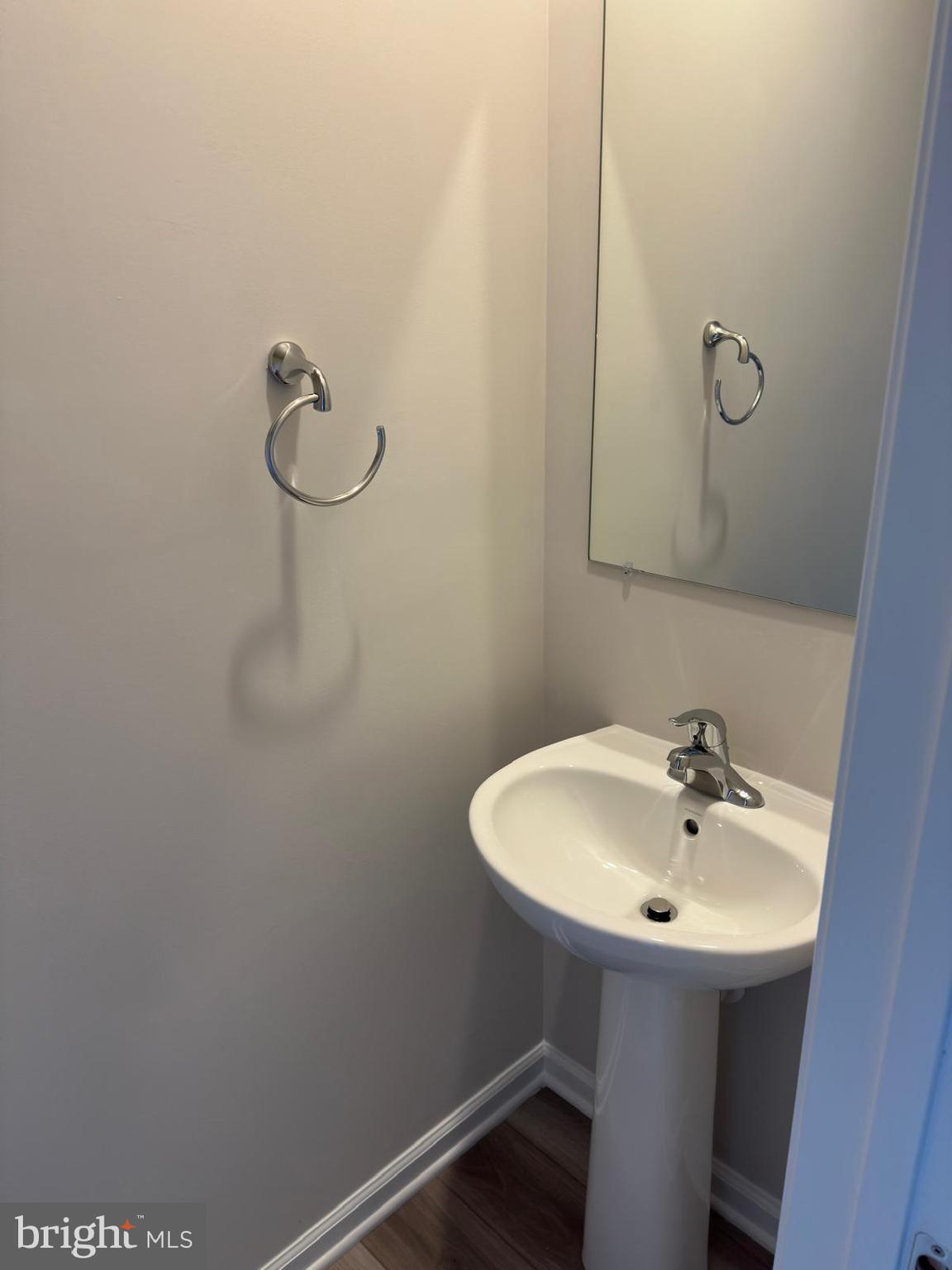 1260 Red Clover Lane Ranson, WV 25438 - Photo 20 of 20 a bathroom with a sink a mirror and shower