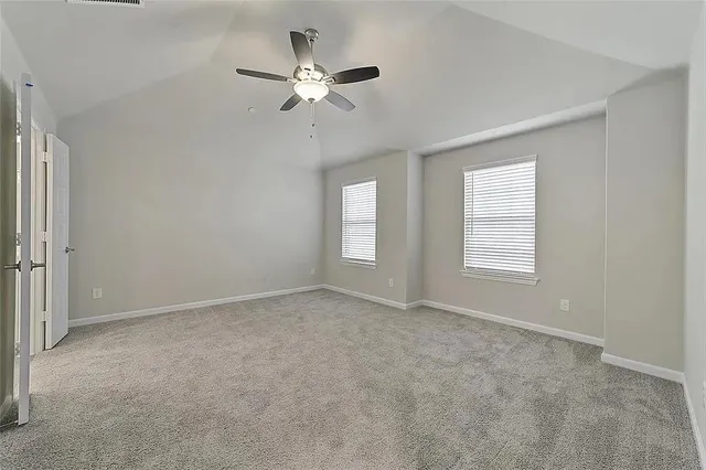 a bathroom with a double vanity sink mirror and shower