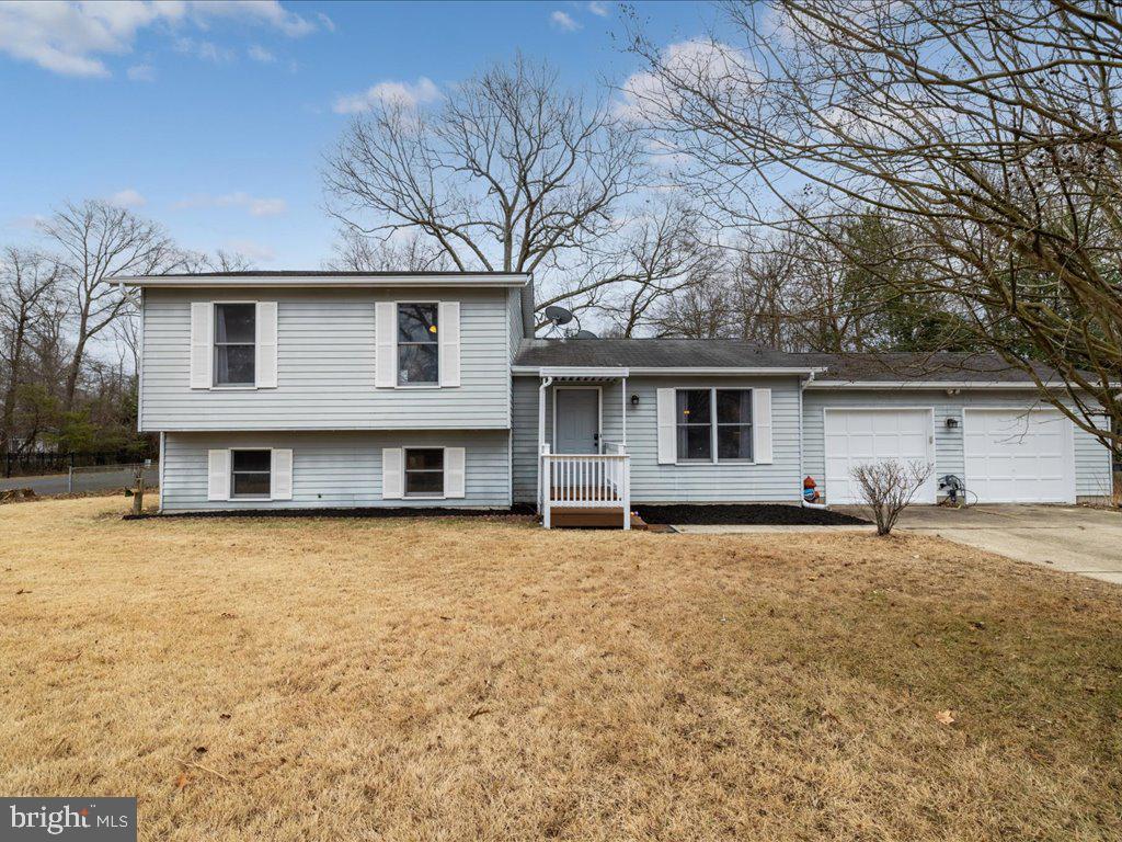 251 Ullman Road Pasadena, MD 21122 - Photo 3 of 29 front view of a house with a yard