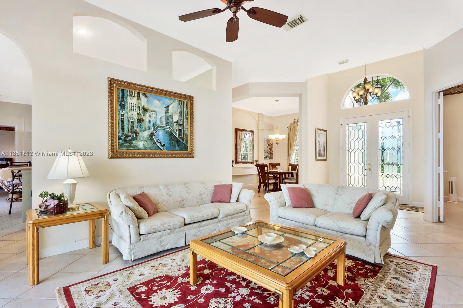 1237 Southwest Blue Stem Way Stuart, FL 34997 - Photo 11 of 48 a living room with furniture
