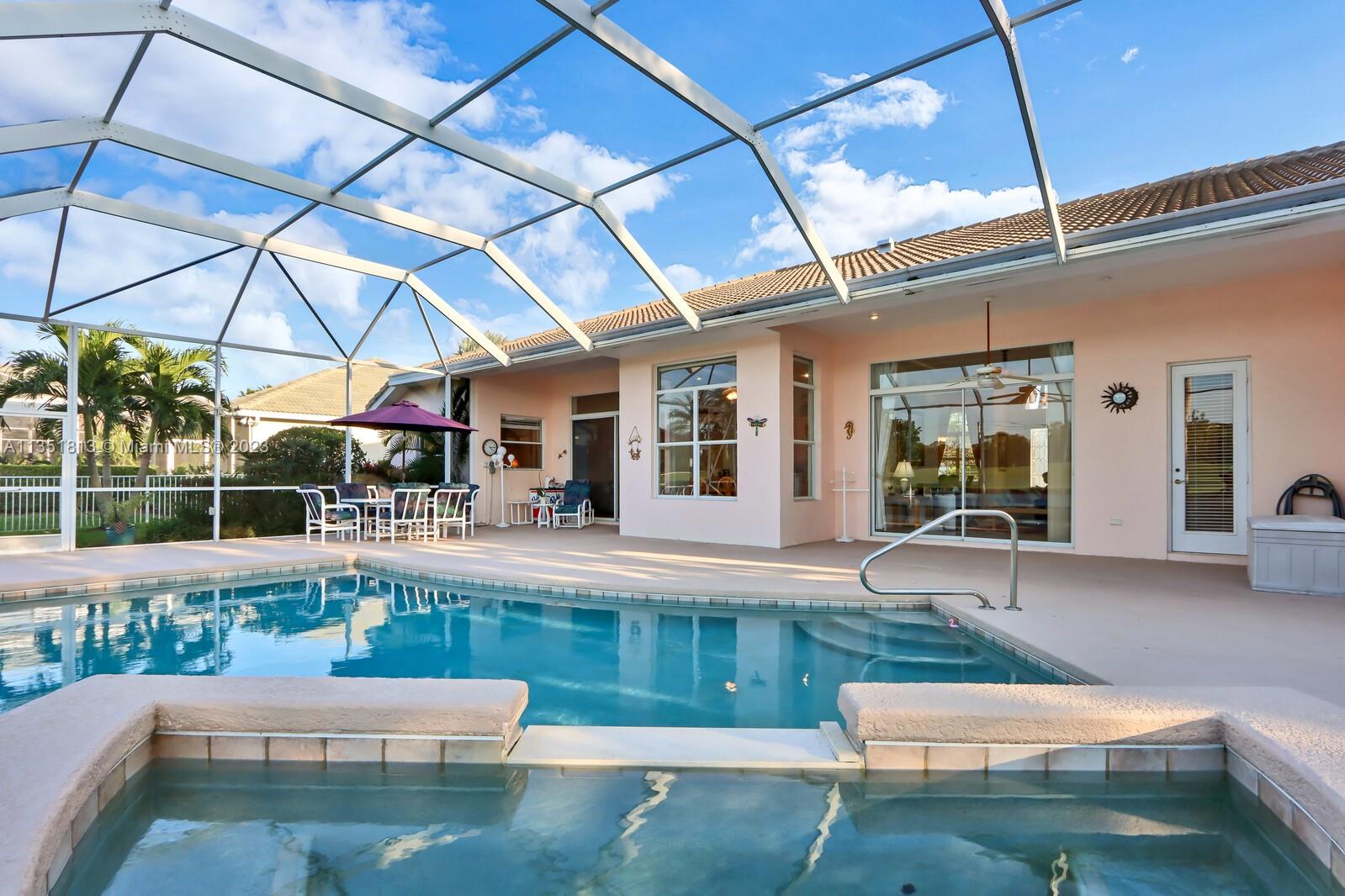 1237 Southwest Blue Stem Way Stuart, FL 34997 - Photo 39 of 48 a living room with fireplace furniture and a potted plant