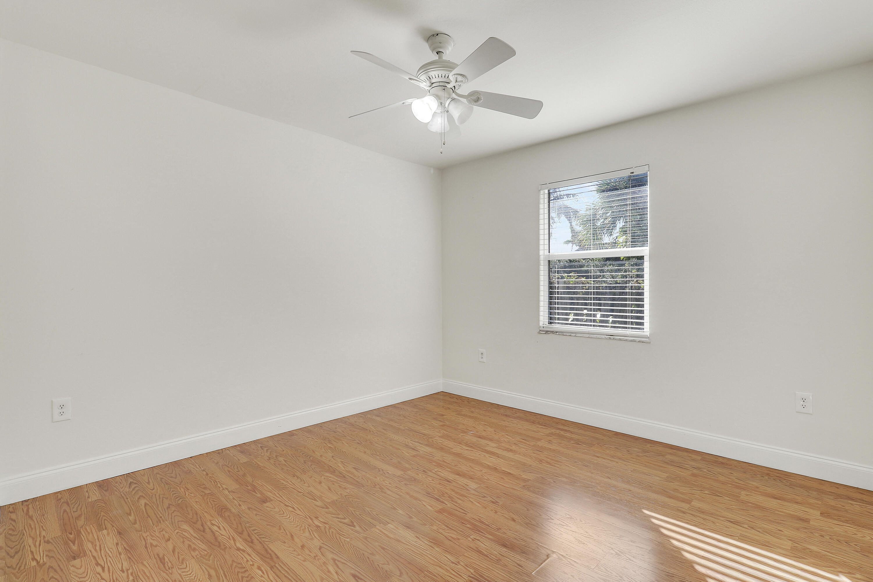6264 Allen Street Jupiter, FL 33458 - Photo 22 of 27 a view of an empty room with a window