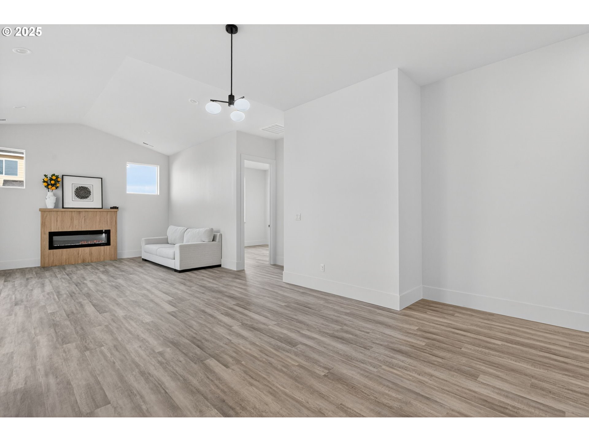 632 Southeast 35th Street Battle Ground, WA 98604 - Photo 12 of 34 a view of empty room with wooden floor