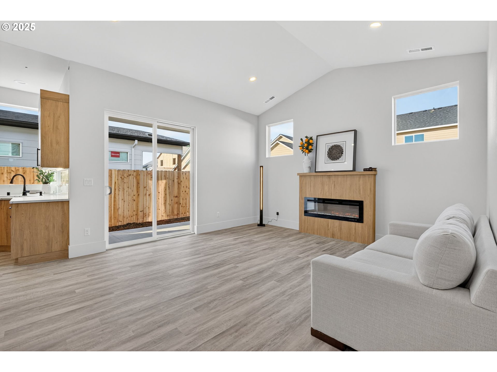 632 Southeast 35th Street Battle Ground, WA 98604 - Photo 14 of 34 a living room with furniture and a fireplace