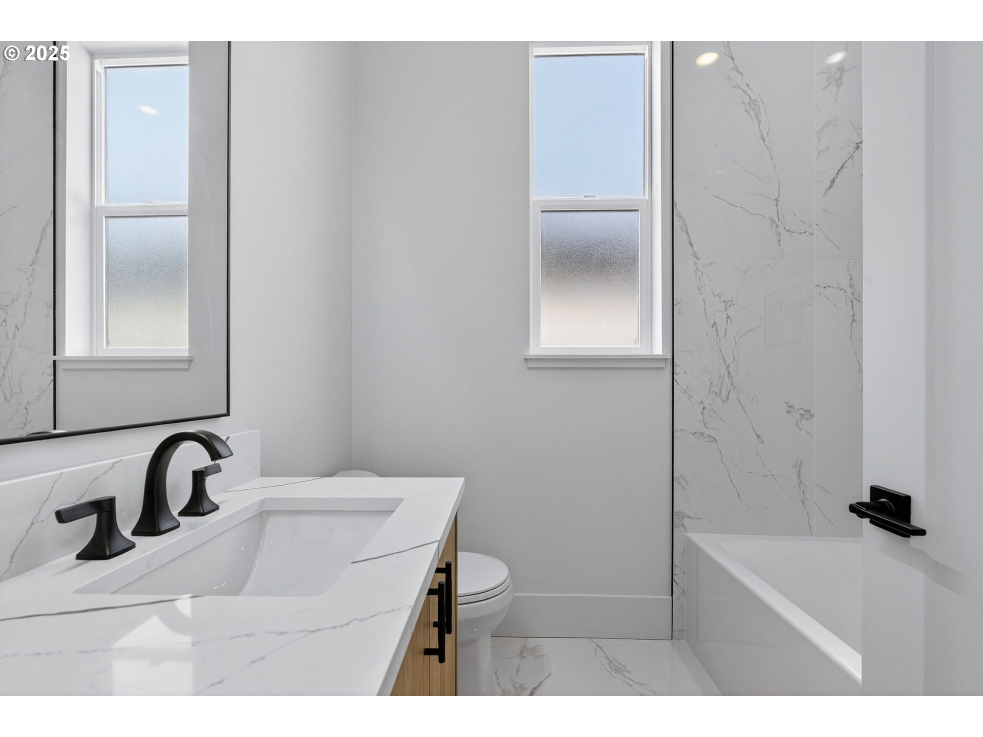 632 Southeast 35th Street Battle Ground, WA 98604 - Photo 26 of 34 a bathroom with a sink and mirror
