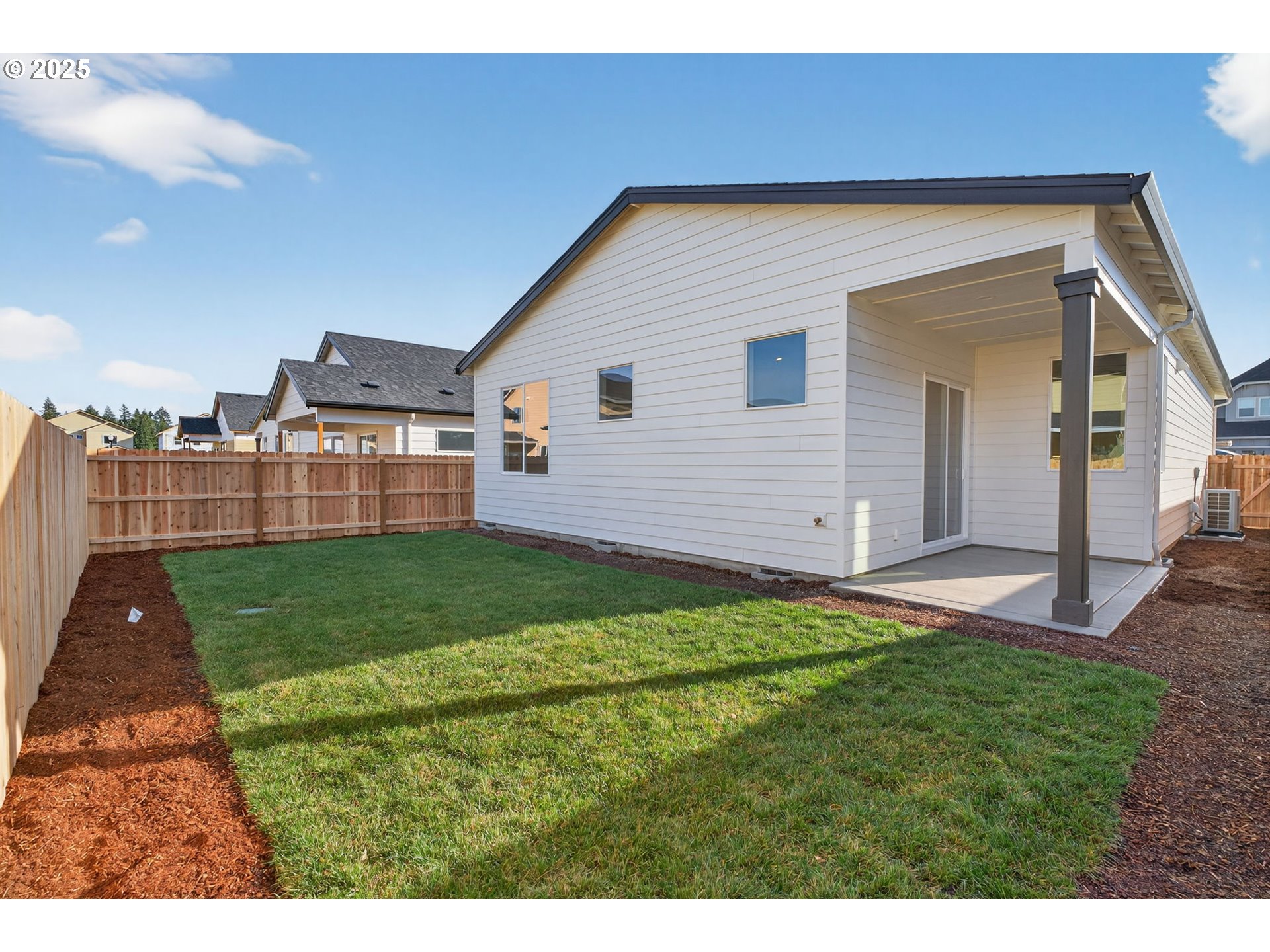 632 Southeast 35th Street Battle Ground, WA 98604 - Photo 32 of 34 a backyard of a house with lots of green space