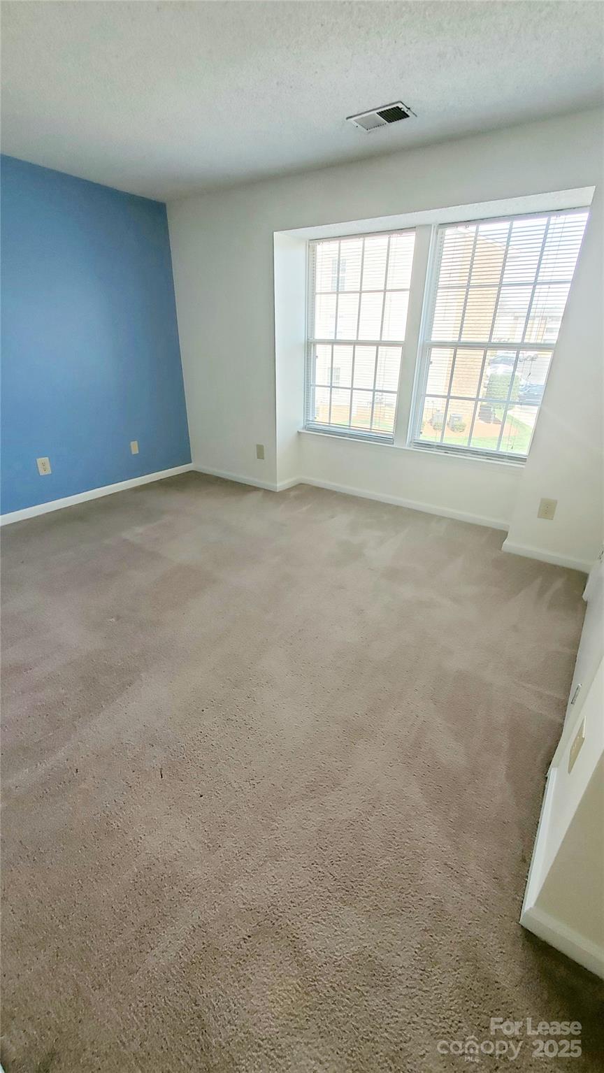 1610 Arlyn Circle Charlotte, NC 28213 - Photo 13 of 25 an empty room with windows