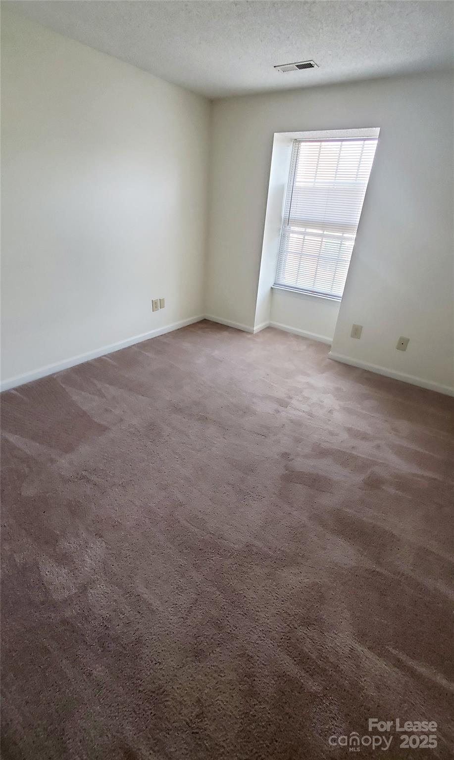 1610 Arlyn Circle Charlotte, NC 28213 - Photo 16 of 25 an empty room with windows