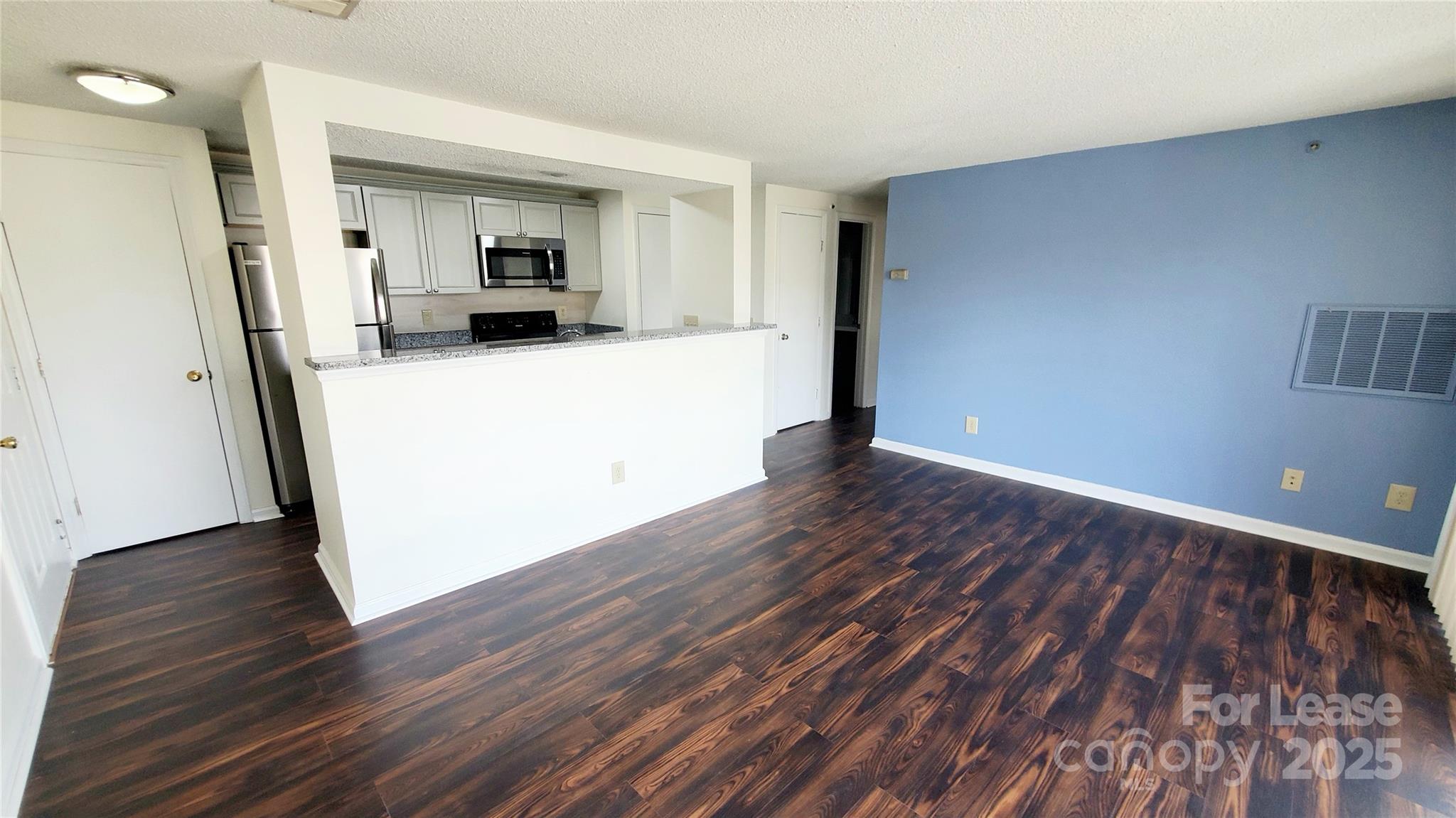 1610 Arlyn Circle Charlotte, NC 28213 - Photo 10 of 25 a view of a kitchen from a hallway
