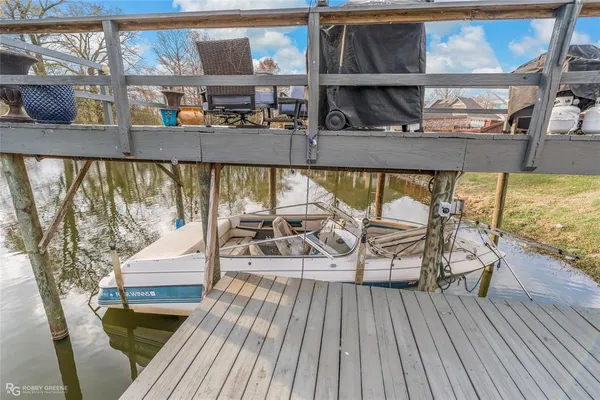 a view of swimming pool with seating area