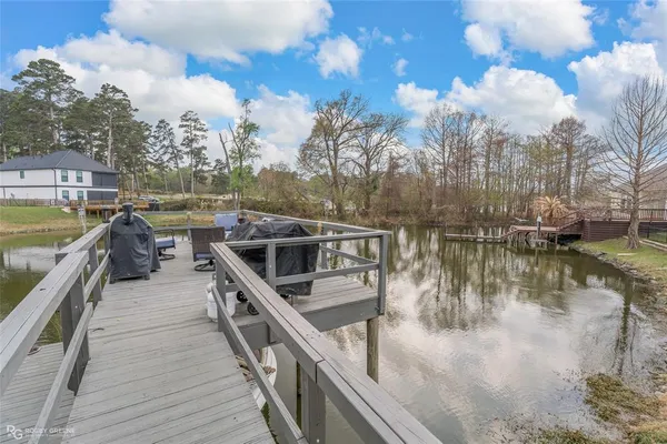 a view of a lake with a deck
