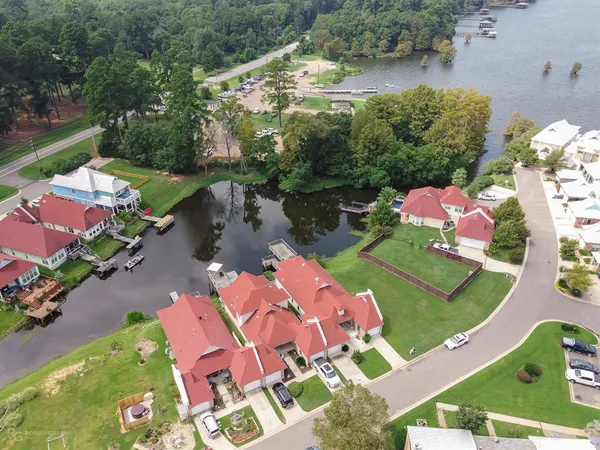an aerial view of a house with outdoor space