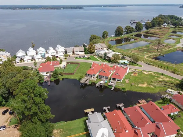 an aerial view of a houses with outdoor space
