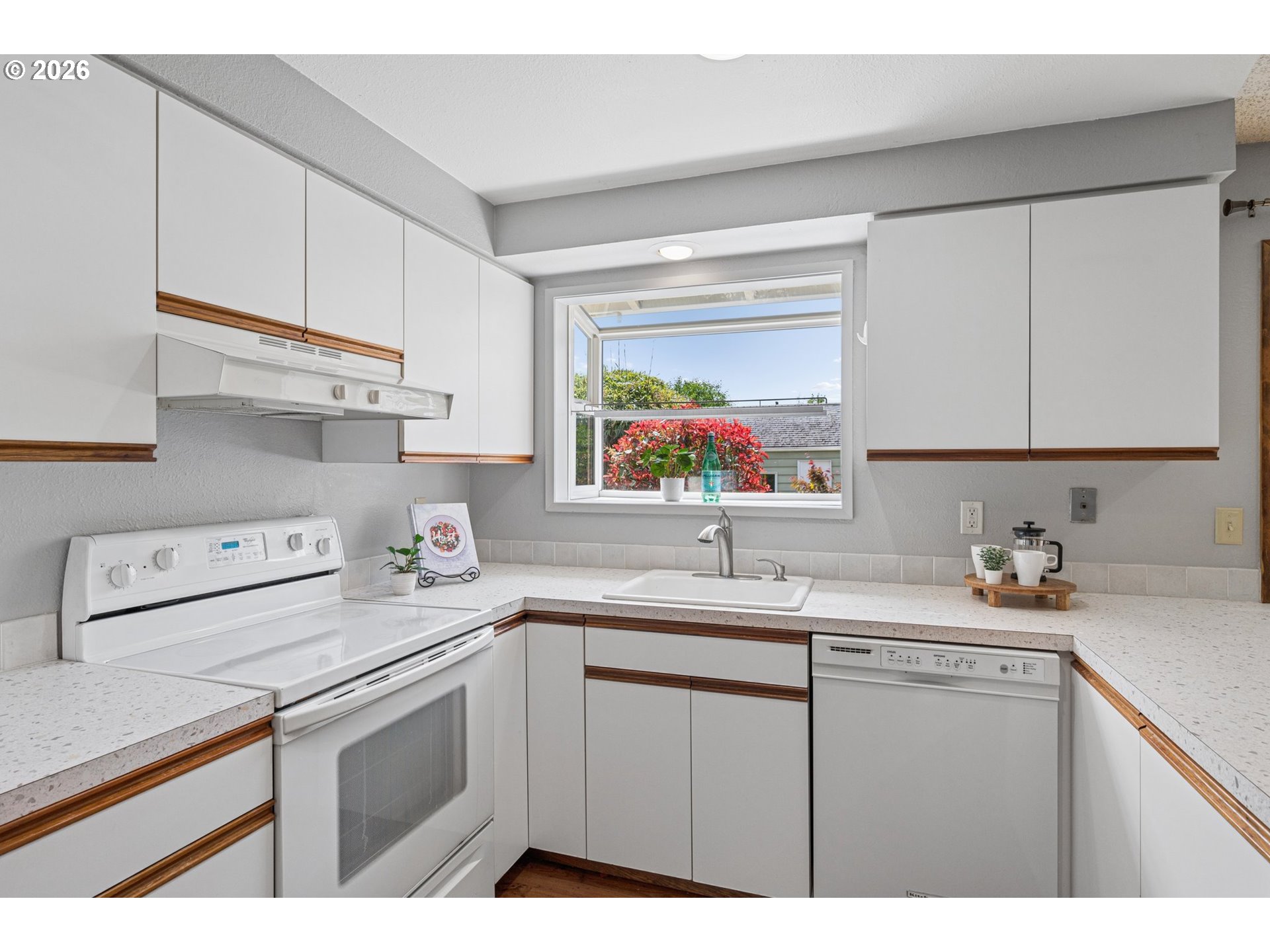 255 West Berkeley Street Gladstone, OR 97027 - Photo 14 of 37 a kitchen with a sink cabinets and window