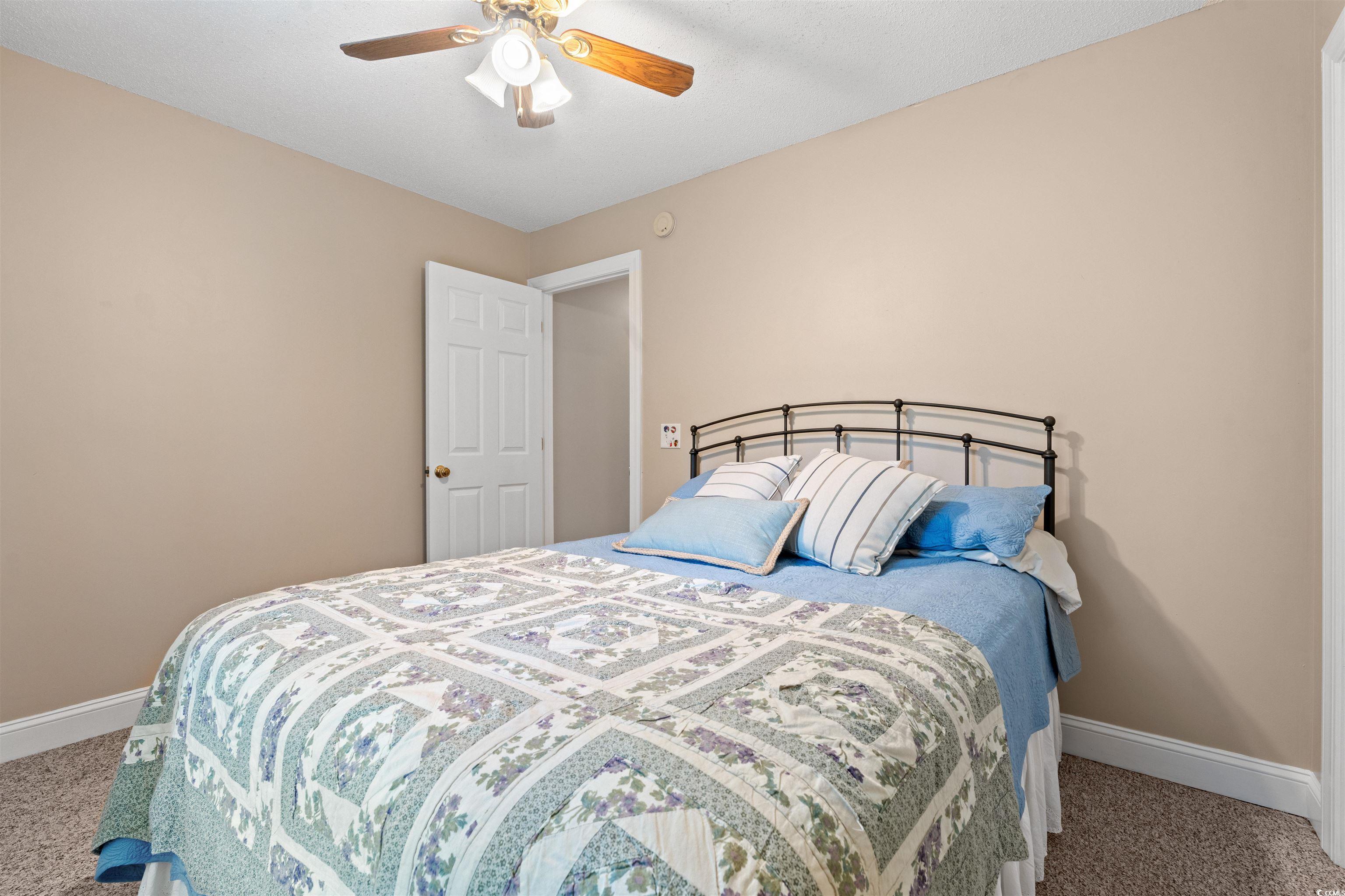 938 Fox Hollow Road Conway, SC 29526 - Photo 12 of 39 Carpeted bedroom with baseboards and ceiling fan