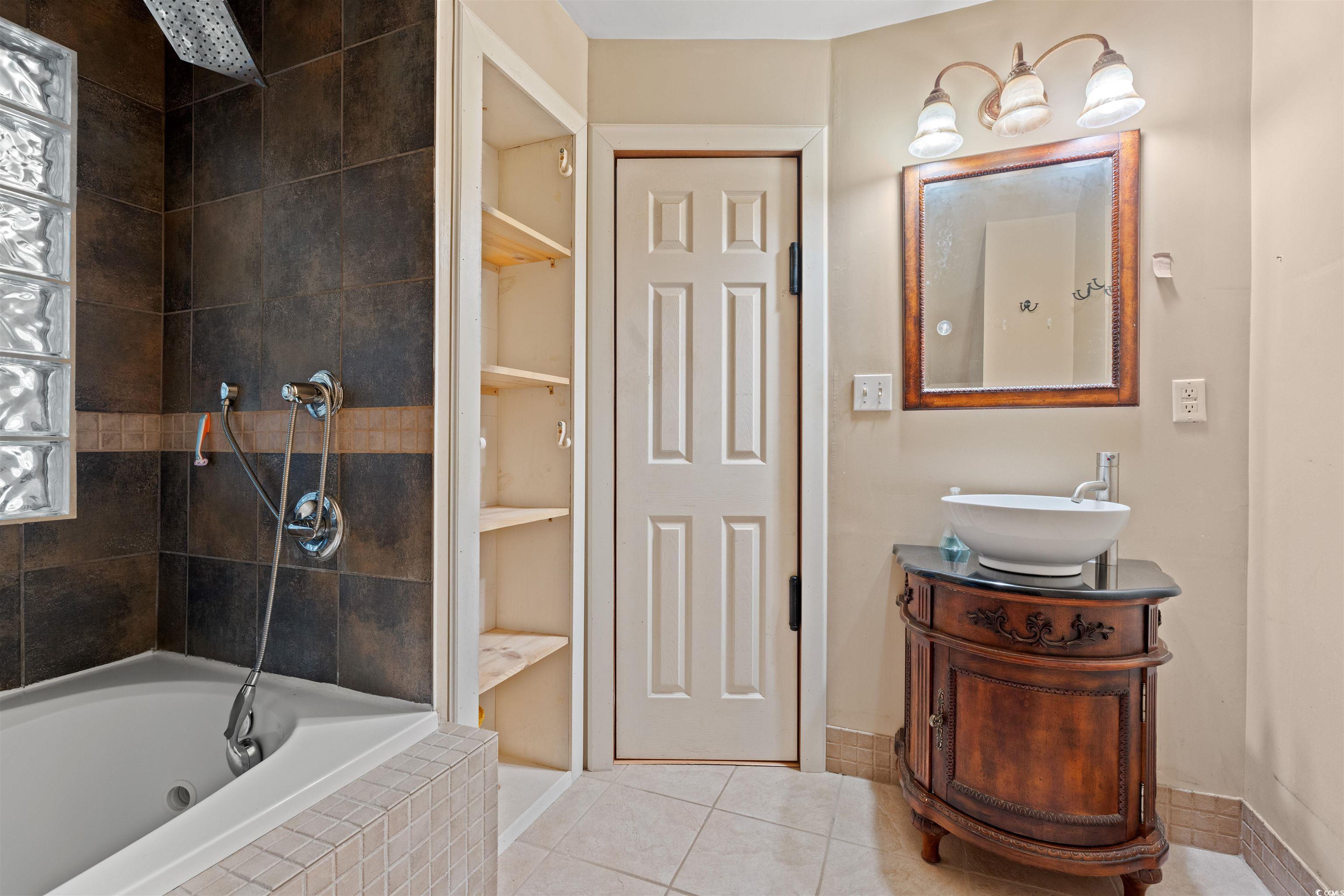 938 Fox Hollow Road Conway, SC 29526 - Photo 17 of 39 Bathroom featuring vanity and tile patterned floors