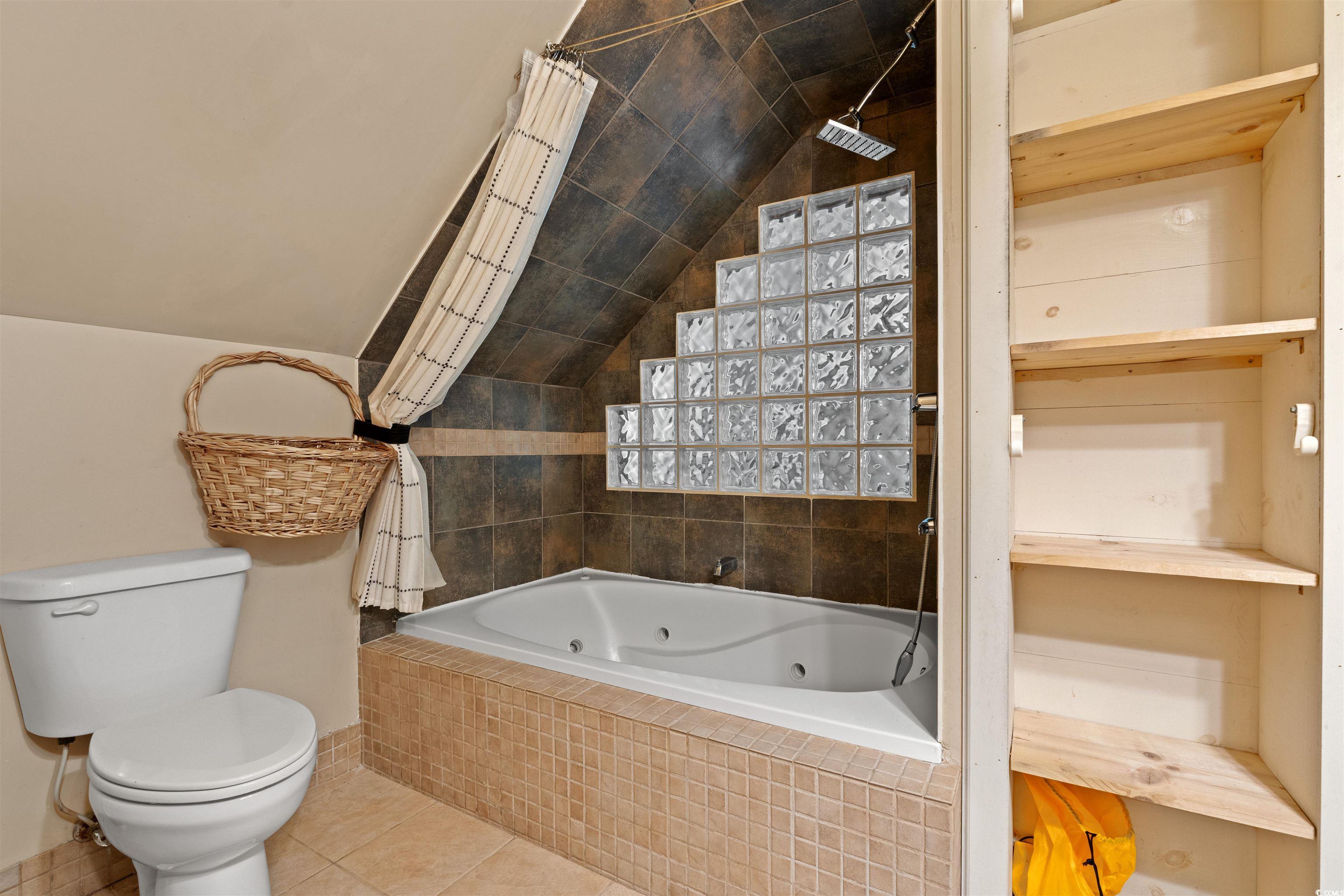 938 Fox Hollow Road Conway, SC 29526 - Photo 18 of 39 Bathroom featuring tile patterned floors and lofted ceiling