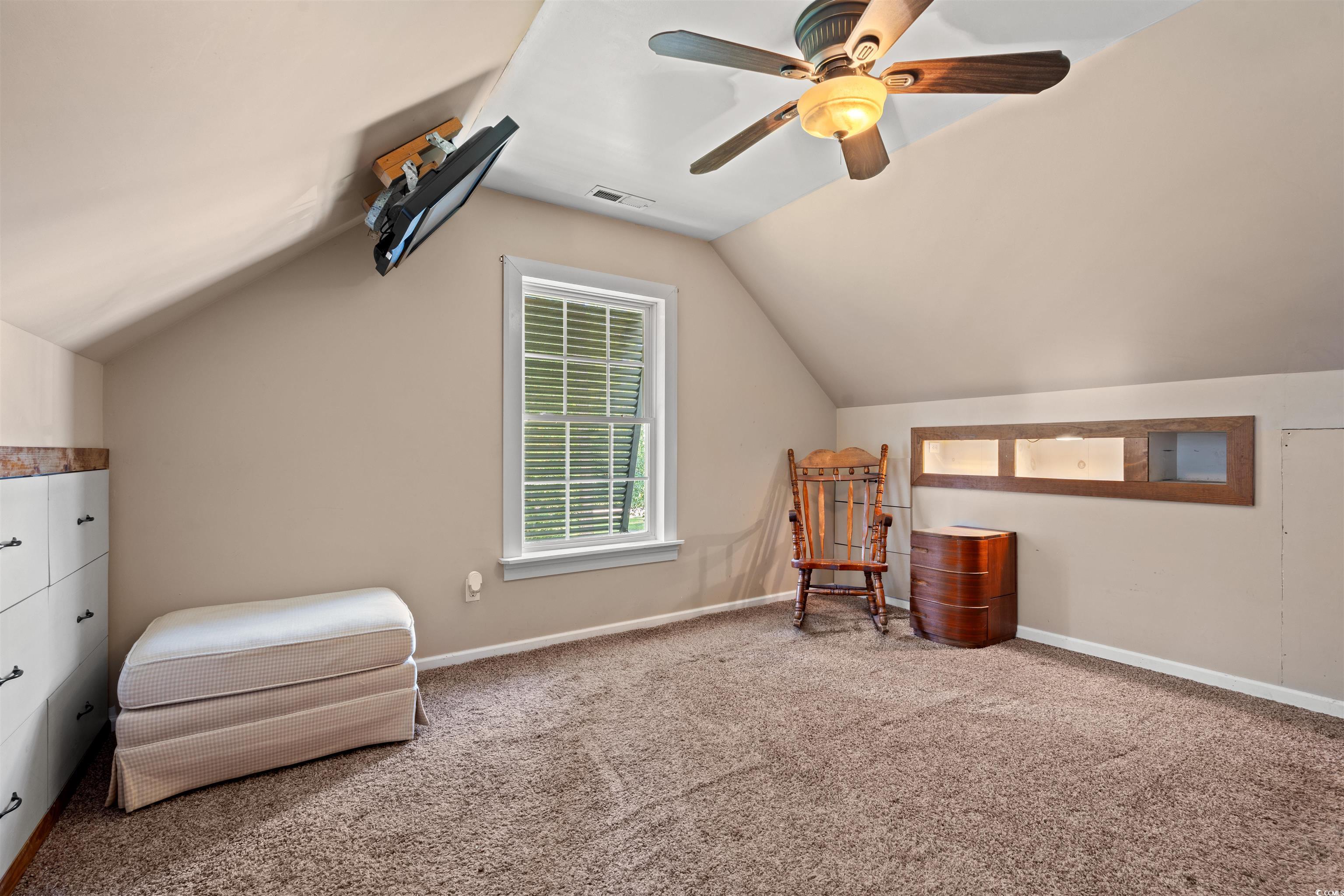 938 Fox Hollow Road Conway, SC 29526 - Photo 19 of 39 Sitting room featuring vaulted ceiling, carpet floors, and a ceiling fan
