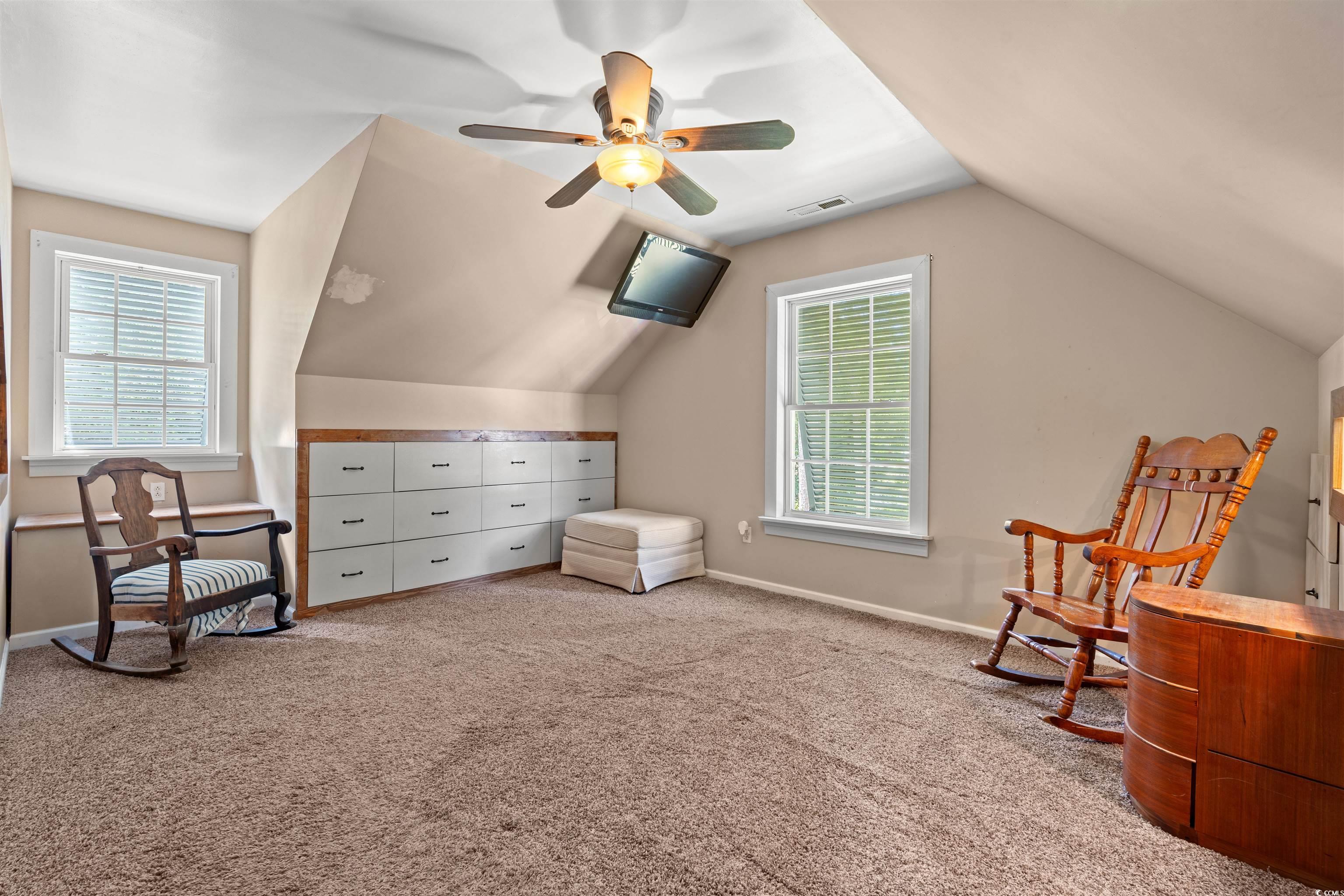 938 Fox Hollow Road Conway, SC 29526 - Photo 20 of 39 Sitting room featuring lofted ceiling, carpet, and a ceiling fan