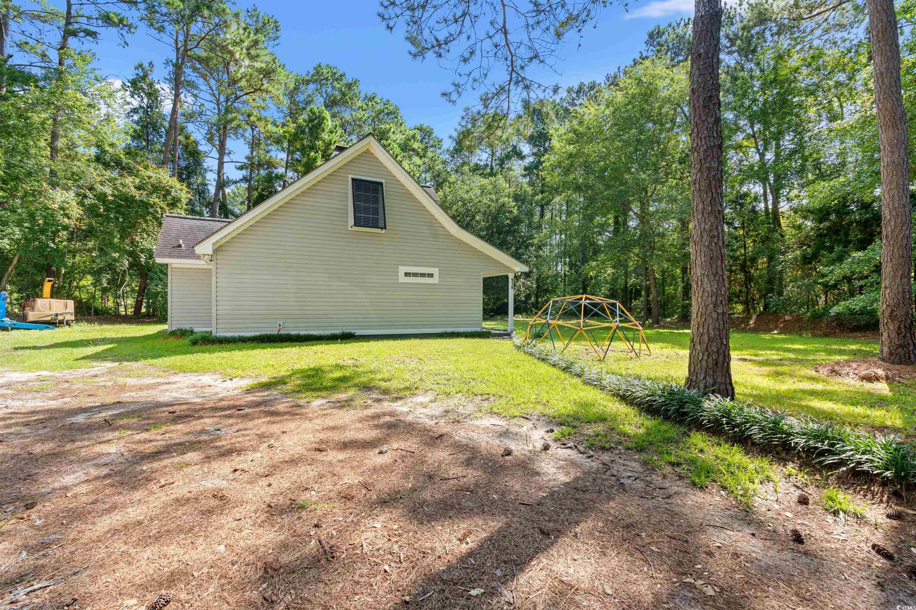 938 Fox Hollow Road Conway, SC 29526 - Photo 24 of 39 View of property exterior with a lawn and a playground