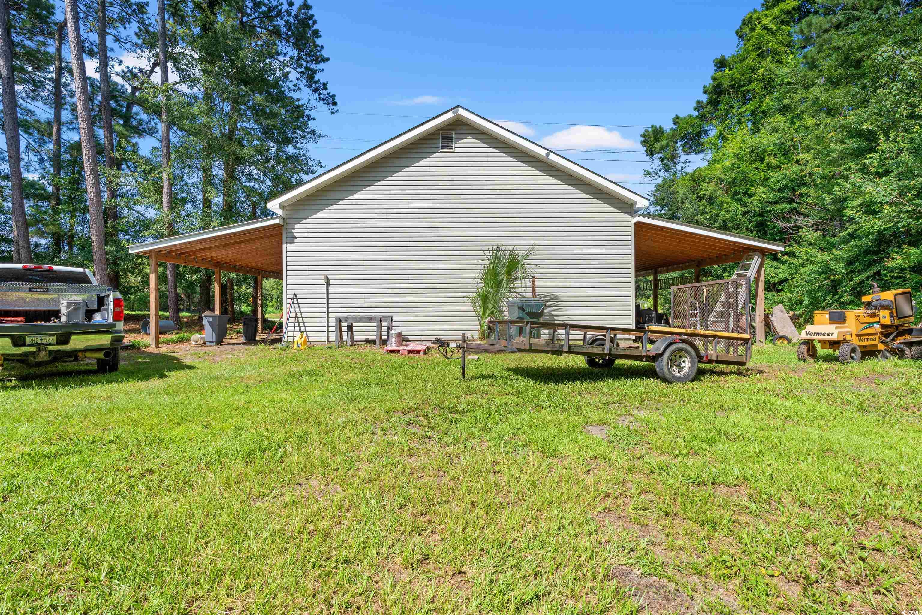 938 Fox Hollow Road Conway, SC 29526 - Photo 26 of 39 View of side of home with a yard