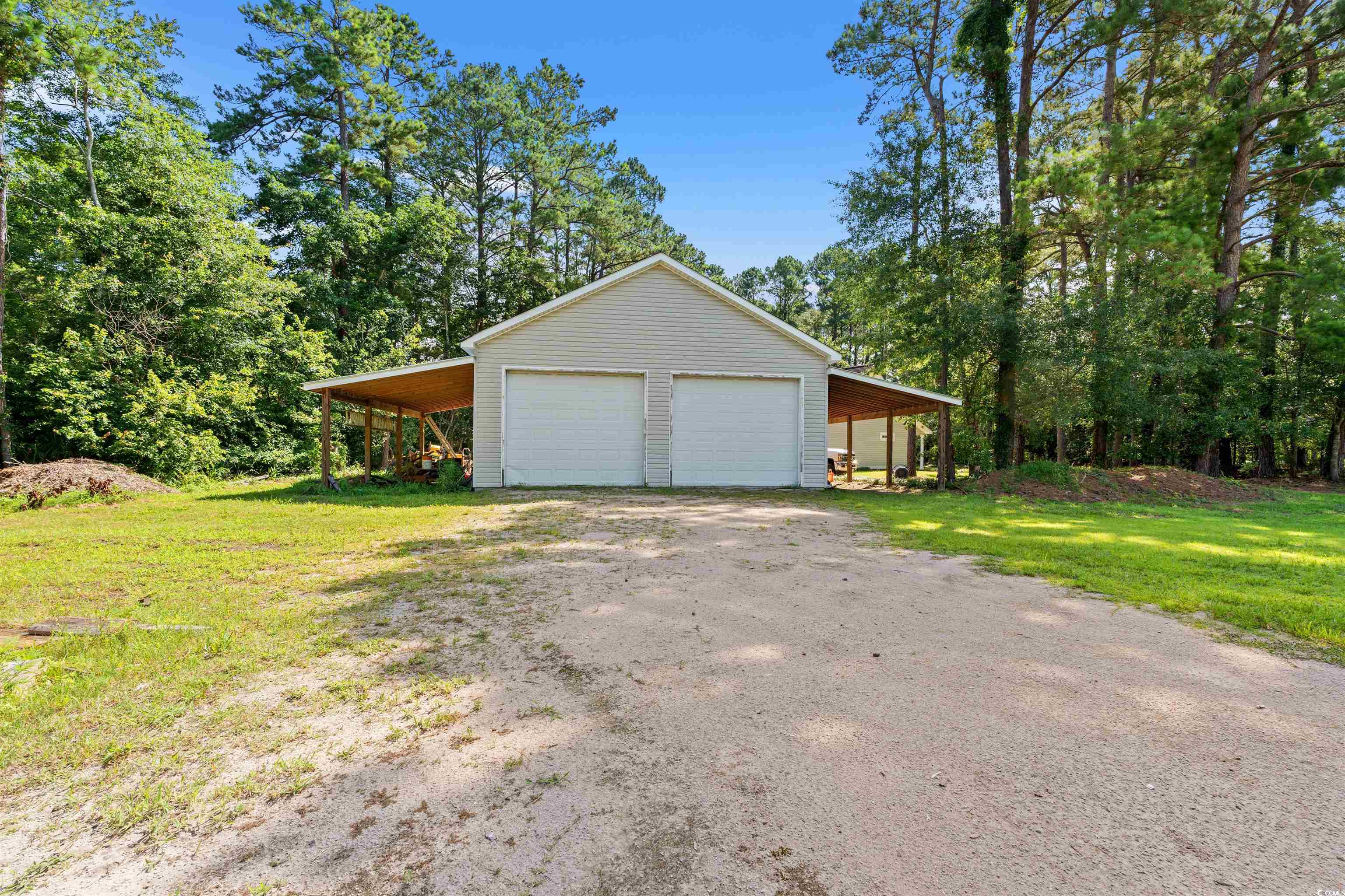 938 Fox Hollow Road Conway, SC 29526 - Photo 27 of 39 Garage featuring a garage