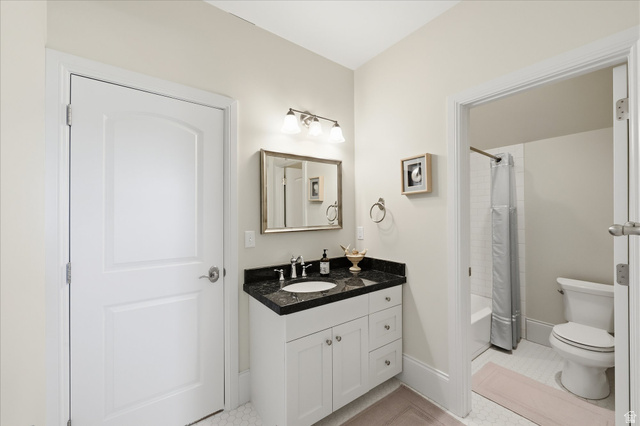 930 Price Farm Court Midway, UT 84049 - Photo 31 of 42 Bathroom featuring vanity, divided from shower / bath and toilet area