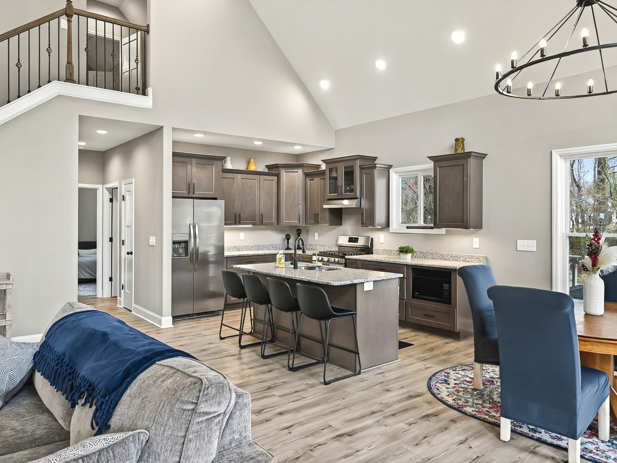 125 Charlie Howell Road Goodspring, TN 38460 - Photo 8 of 46 a living room with stainless steel appliances kitchen island granite countertop furniture and a kitchen view