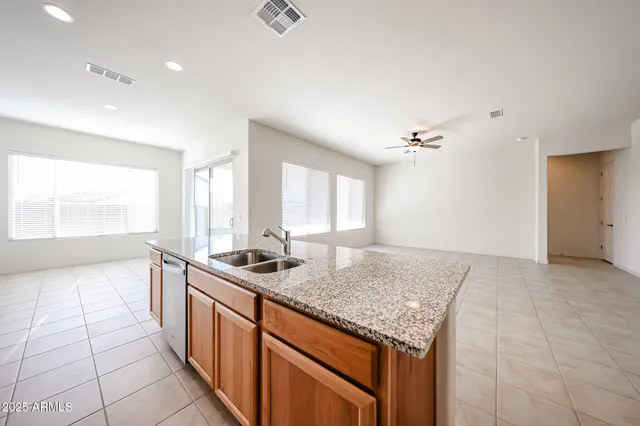 a kitchen with sink and window