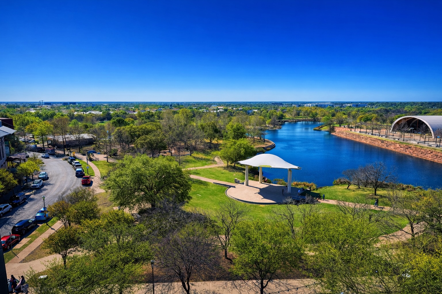 1701 Simond Avenue, Unit 625 Austin, TX 78723 - Photo 10 of 23 a view of a lake with a yard