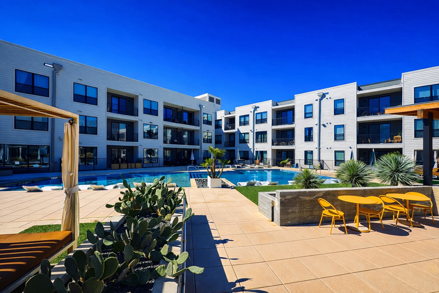 1701 Simond Avenue, Unit 625 Austin, TX 78723 - Photo 11 of 23 a view of a swimming pool with a patio