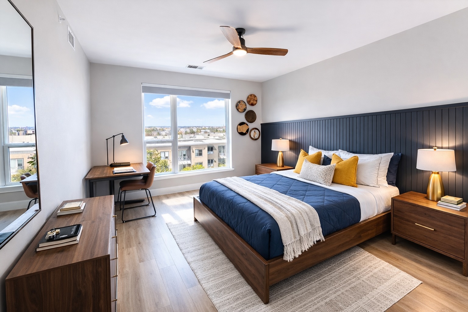 1701 Simond Avenue, Unit 625 Austin, TX 78723 - Photo 4 of 23 a bedroom with a bed and wooden floor