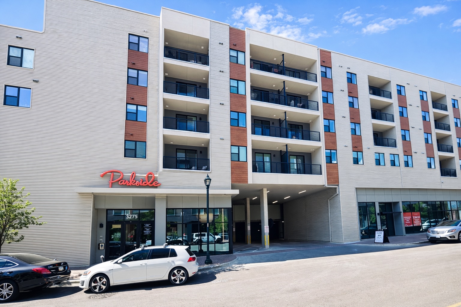 1701 Simond Avenue, Unit 625 Austin, TX 78723 - Photo 8 of 23 a view of building with cars parked in front of it