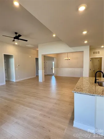 a view of a kitchen with a sink