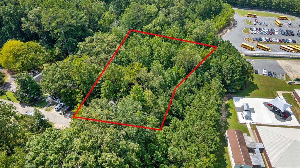 0 Reed Street Canton, GA 30114 - Photo 6 of 13 an aerial view of a house with a yard and garden